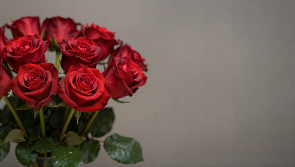 Romantic gesture red roses bouquet indoor setting floral arrangement soft lighting concept of love