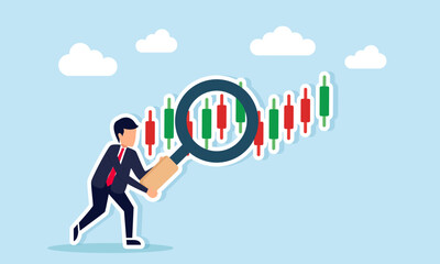 Businessman examining a candlestick chart with magnifying glass showing stock performance analysis
