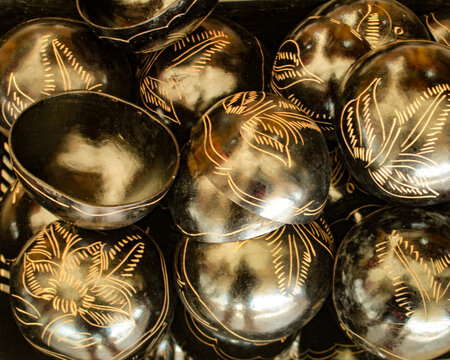 Indigenous bowls, handicrafts from the Brazilian Amazon, made from the fruit of the Crescentia cujete, decorated with geoglyphs, for sale as souvenirs to tourists in the city of Bel&eacute;m, Par&aacute;, Brazil