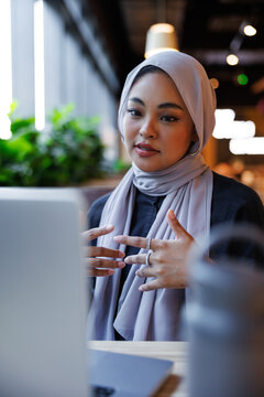 Woman in hijab on video call