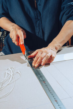 Cutting paper.