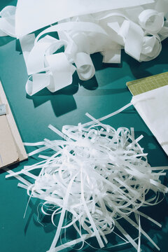 Detail /Papers in bookbinding workshop.