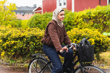 Young Woman Riding a Bicycle