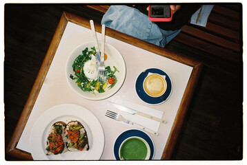 Fresh salad and colorful dishes served on a table 