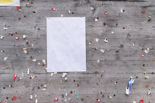 Blank White Paper Sheet on Wooden Bulletin Board