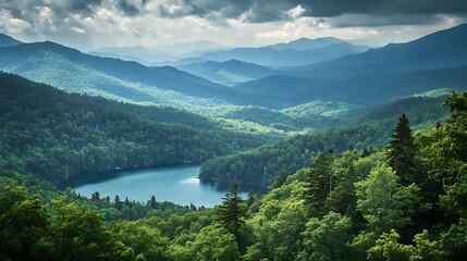 Serene mountain lake surrounded by lush green forest and rolling hills in atmospheric light