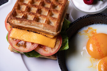 Delicious Waffle Sandwich With Fresh Ingredients and Soft-Boiled Egg