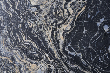 Beautiful black marble with swirling patterns and lines