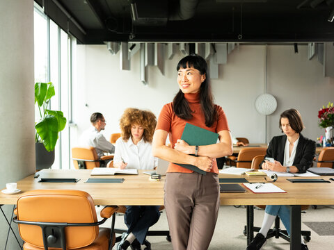 Portrait Of a Confident Female Team Leader in the Open Space Office