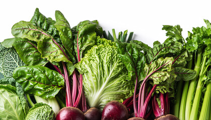 Freshly harvested vibrant green leafy vegetables and red beets on a white background.