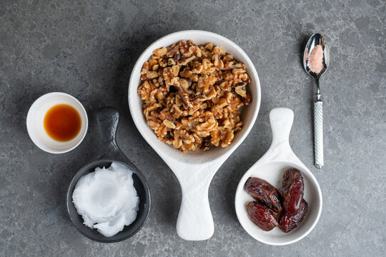 Overhead flat lay of ingredients for raw vegan nut dessert