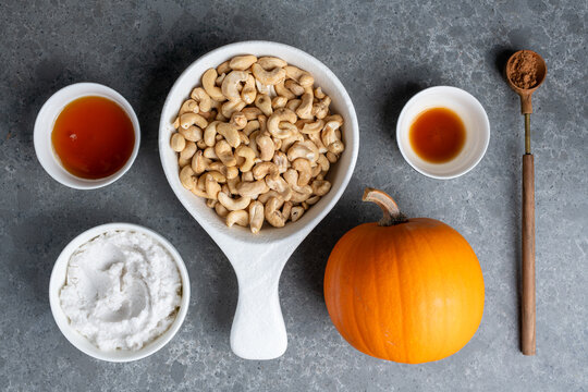 Overhead flat lay of ingredients for raw vegan nut dessert