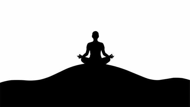 Silhouette of a person meditating in a serene pose on a hill.