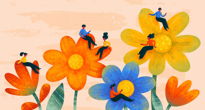 People are sitting on huge colorful flowers