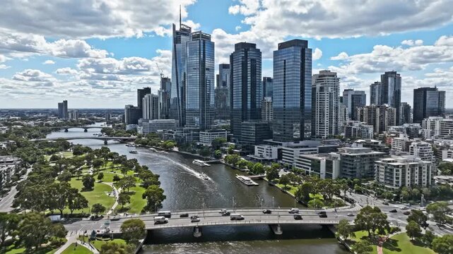 Aerial view of brisbane city skyline with modern skyscraper, river, bridge, and lush green parkland under a cloudy sky vector illustration