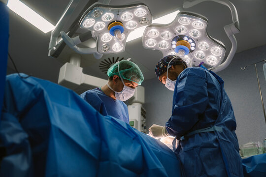 Surgeons performing surgery during a hospital operation