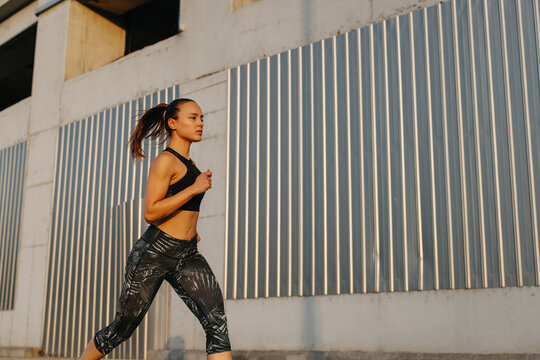 Woman running in the city