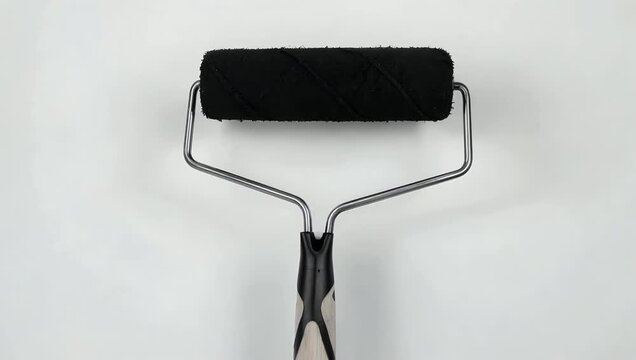 A high resolution monochrome 4K close up of a paint roller presented in a clean minimal composition ideal for branding renovation visuals graphic design mockups artistic concepts and creative digital
