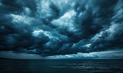 Stormy ocean horizon, ominous dark clouds fill the sky