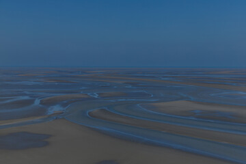 View of the bay floor during low tide.