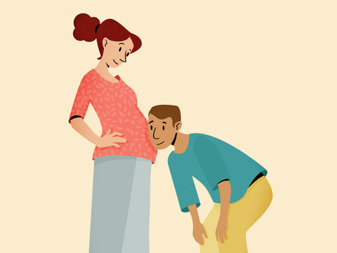 Pregnant woman and man listening to baby in belly