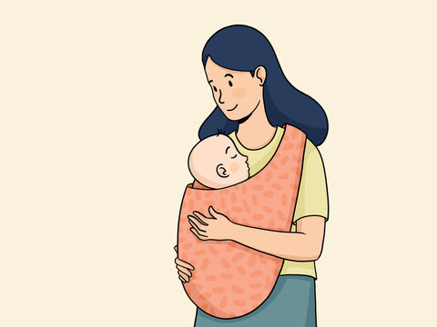 Mother babywearing newborn, bonding with child