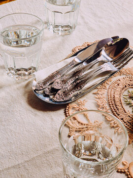 Family meal table set with cutlery