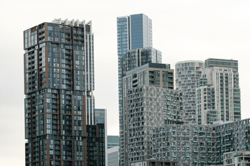 Obraz premium Modern residential skyscrapers dominating contemporary urban cityscape