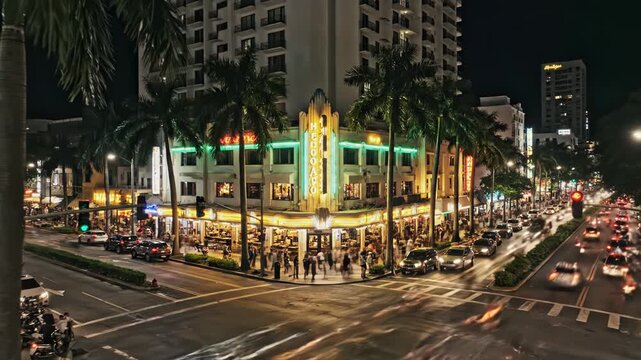 Nighttime long exposure view of the historic art deco colony theatre on lincoln road, miami beach vector illustration