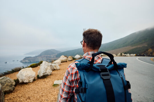 Man stands on the Big Sur