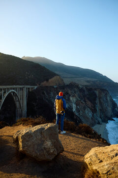 Man stands near Bixby Creek Bridge