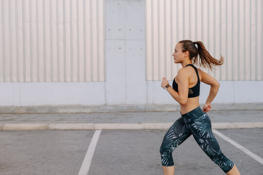 Woman running in the city