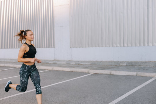 Woman running in the city