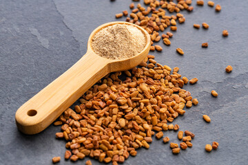 Measuring spoon with organic fenugreek seeds - Methi Dana
