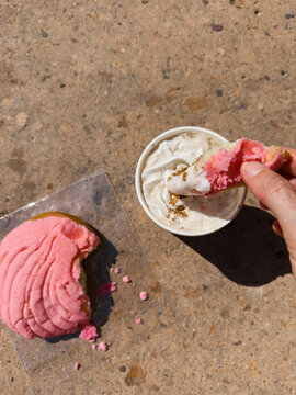 Dipping Concha in Mexican Hot Chocolate