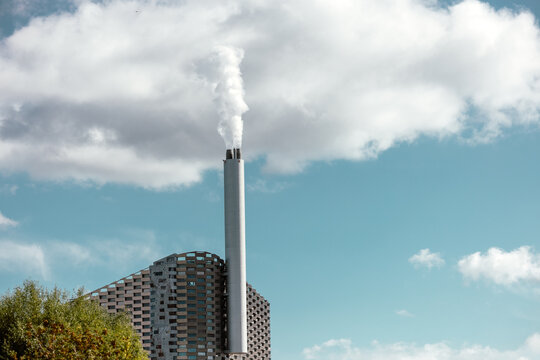 Modern Factory Chimney Emitting Steam