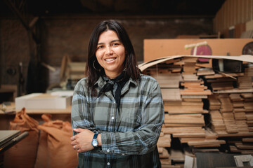 Latina Woodworker Smiling in Studio