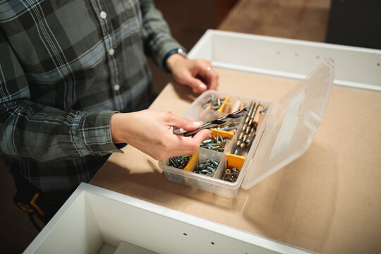 Selecting Drill Bits in Woodworking Workshop