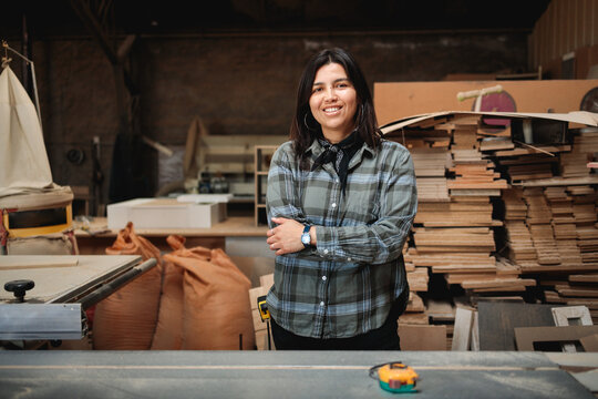 Latina Carpenter in Woodworking Studio
