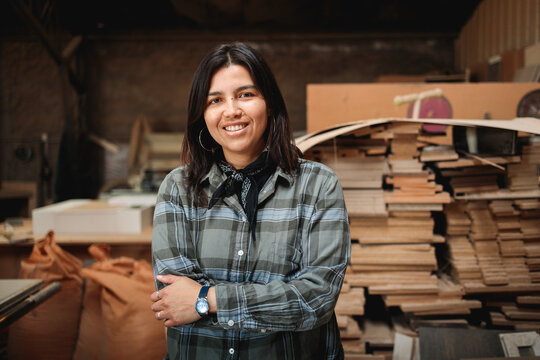 Latina Woodworker Smiling in Studio