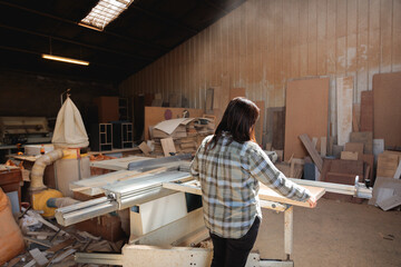 Craftswoman Working in a Sunlit Workshop