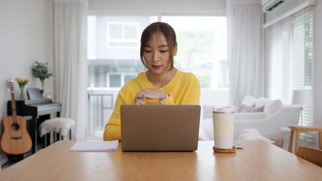 Gen Z workforce work hybrid workplace. Young adult asia people sit learn from online study class at home digital nomad stretch arm stiff neck pain yoga self care body relax stress relief break time.