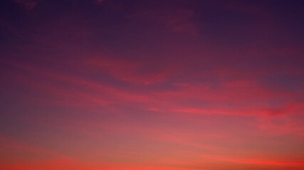 A sunrise sky time-lapse featuring vibrant altocumulus and cirrus clouds glowing in deep pink and orange tones, capturing the soft morning light as layered textures drift across the horizon.
- Powered by Adobe