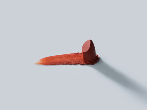 Lipstick swatch and lipstick on a light background