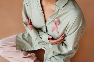 Embracing Awareness With a Pink Ribbon on Warm Tones