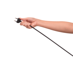 Close-up of a hand holding a black electric power cord plug isolated on transparent PNG.