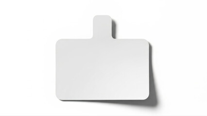 White sticky name badge isolated on a plain background with shadow, featuring a rectangular shape and a tab for easy application, minimalist design