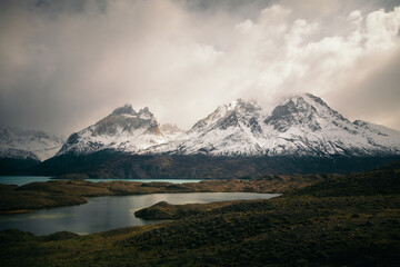Lake reflecting towering Patagonian mountains