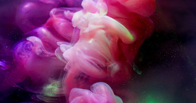 Glitter mix. Ink splash. Defocused pink purple green color shiny cloud swirling water spreading on abstract dark black background. - Powered by Adobe