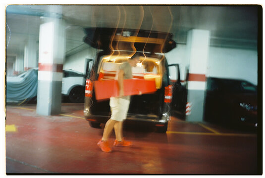Man Loading Furniture Into Van